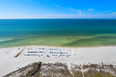 an aerial view of a beach with the ocean at Grand Panama #1-2101 in Panama City Beach