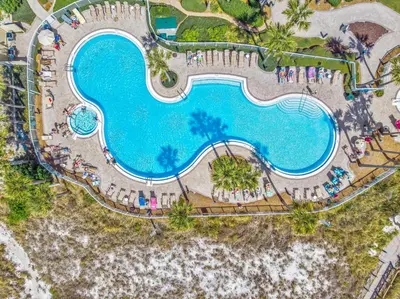 an overhead view of a swimming pool at a resort at Grand Panama #2-0603 in Panama City Beach