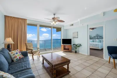 a living room with a view of the ocean at Shores Of Panama #1412 in Panama City Beach