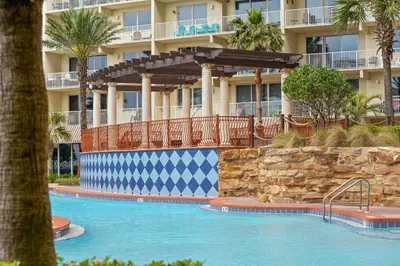 a swimming pool in front of a hotel at Shores Of Panama #1508 in Panama City Beach