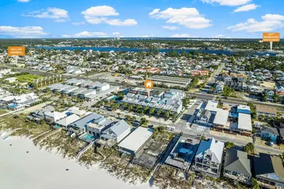 an aerial view of a city next to the beach at Spectacular Gulf Views w/ PRIVATE POOL! Remarkable 3BR 35BA Bedding for 12! in Panama City Beach