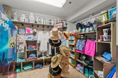 a childs shop with hats and other items at Calypso #3-607 in Panama City Beach