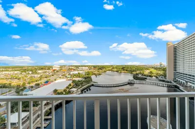 a view of a river from a balcony of a building at Laketown Wharf #934 by Nautical Properties in Panama City Beach