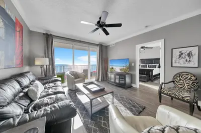 a living room with a couch and a table at Ocean Reef 704 in Panama City Beach