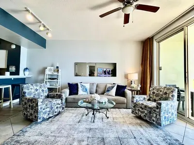 a living room with a couch and two chairs at Amazing views! Great beachfront Panama City Condo in Panama City Beach
