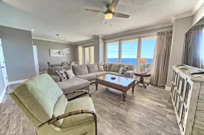 a living room with a couch and a table at Oceanfront Paradise in Gated Community - 2304 condo in Panama City Beach