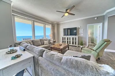 a living room with a couch and a table at Oceanfront Paradise in Gated Community - 2304 condo in Panama City Beach