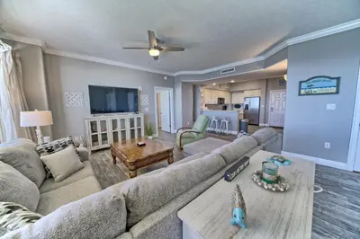 a living room with a couch and a table at Oceanfront Paradise in Gated Community - 2304 condo in Panama City Beach