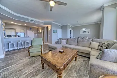 a living room with a couch and a table at Oceanfront Paradise in Gated Community - 2304 condo in Panama City Beach