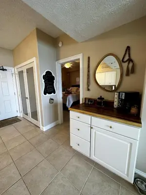a bathroom with a sink and a mirror on the wall at Seaside Bliss in Gated Community - 1504 condo in Panama City Beach