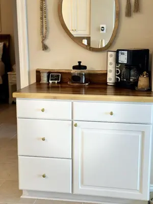 a white cabinet with a counter top and a mirror at Seaside Bliss in Gated Community - 1504 condo in Panama City Beach