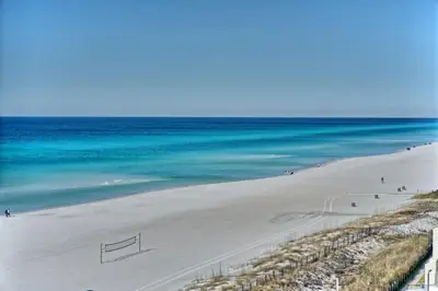 an aerial view of a beach with the ocean at Oceanfront Paradise with Pool Access - 0606 condo in Panama City Beach