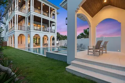 an exterior view of a house with a swimming pool at Sanctuary at Seagrove in Santa Rosa Beach