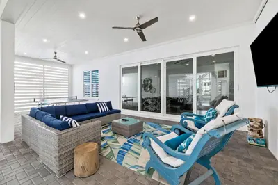 a living room with two chairs and a couch at Seagrove Sparrow in Santa Rosa Beach
