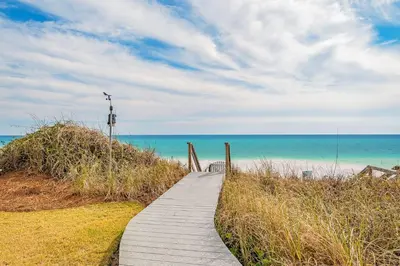 a wooden path to the beach with the ocean at Soleil at Seagrove in Santa Rosa Beach