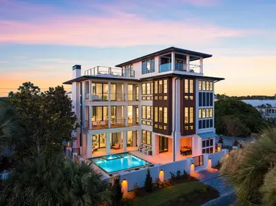 an aerial view of a house with a swimming pool at Above & Beyond in Santa Rosa Beach