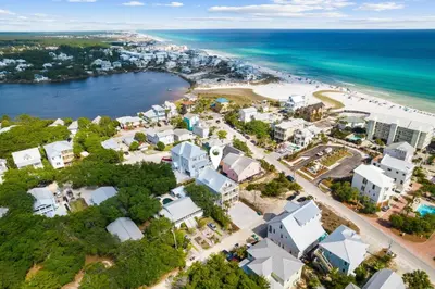 an aerial view of a beach with condos at Idyll Time in Santa Rosa Beach
