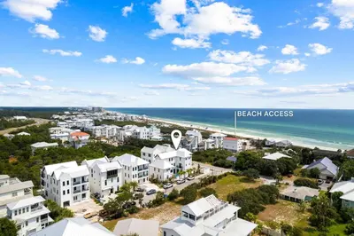 an aerial view of the beach and the ocean at Seven Palms Reunion in Inlet Beach
