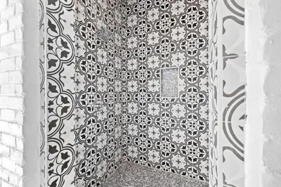 a door with a black and white pattern on it at Bullish On Beaches in Inlet Beach