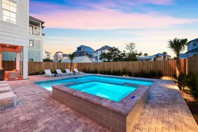 a swimming pool in the backyard of a home at Good Vibrations in Santa Rosa Beach