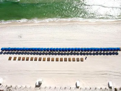 an overhead view of a beach with blue dividers at Tropic Winds 2007 in Panama City Beach