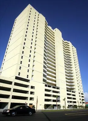 a car parked in front of a large building at Ocean Reef 1802 in Panama City Beach