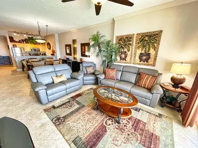 a living room with a couch and a table at Ocean Reef 2101 in Panama City Beach