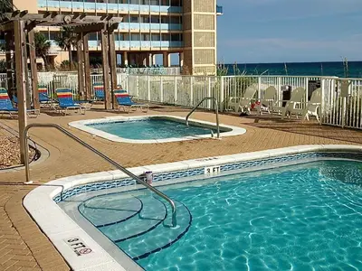 a large swimming pool in a resort with at Ocean Reef 2101 in Panama City Beach