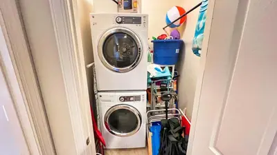 a washer and dryer in a laundry room at Ocean Reef 2101 in Panama City Beach