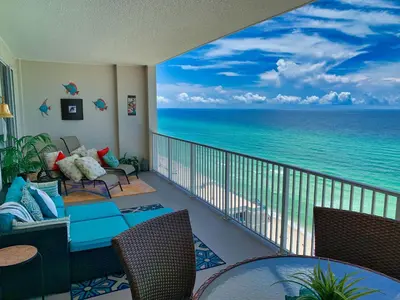 a balcony with a view of the ocean at Ocean Reef 1403 in Panama City Beach