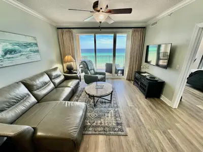 a living room with a couch and a table at Ocean Reef 606 in Panama City Beach