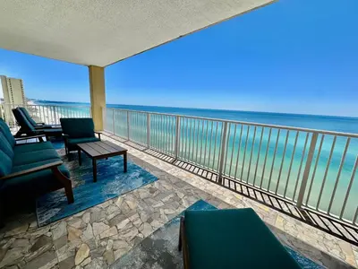 a balcony with a view of the ocean at Tropic Winds 1401 in Panama City Beach