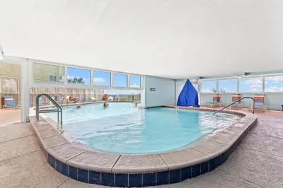 a large swimming pool in a building at Tropic Winds 1901 in Panama City Beach