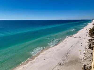 an aerial view of a beach and the ocean at Tropic Winds 1604 in Panama City Beach