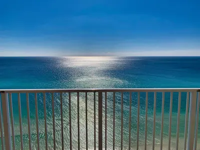 a view of the ocean from a balcony at Tropic Winds 1609 in Panama City Beach
