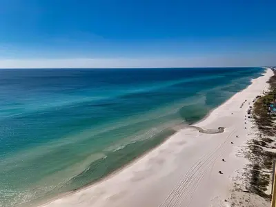 an aerial view of a beach and the ocean at Tropic Winds 1609 in Panama City Beach