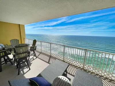 a balcony with a view of the ocean at Tropic Winds 1406 in Panama City Beach
