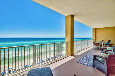 a balcony with a view of the beach at Tropic Winds 703 in Panama City Beach