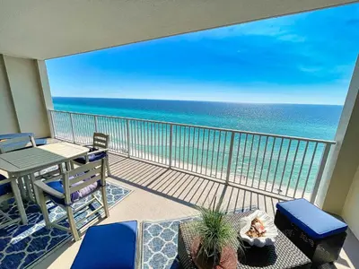 a balcony with a view of the ocean at Ocean Reef 1402 in Panama City Beach
