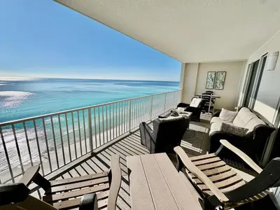a balcony with a view of the beach and the ocean at Ocean Reef 1705 in Panama City Beach