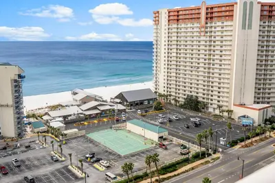 an aerial view of a parking lot with a tennis court at Laketown Wharf #1517 by Nautical Properties in Panama City Beach