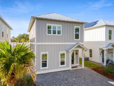 a large house with a garage at Walk to Beach! Sleeps 18 - 10 beds in Rosemary Beach