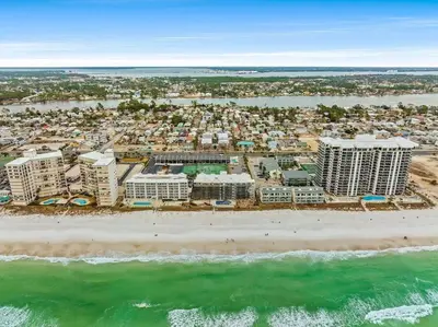 an aerial view of a resort on the beach at Modern Beach Haüs 4 min walk to beach w/ pool BBQ in Panama City Beach