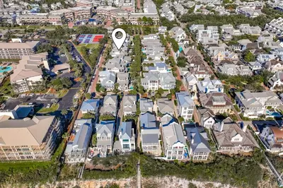 an aerial view of a neighborhood with houses with a white circle on it at Seas The Day in Rosemary Beach