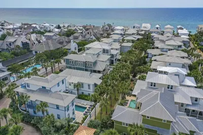 an aerial view of a resort town with houses and the ocean at My Blue Heaven in Rosemary Beach