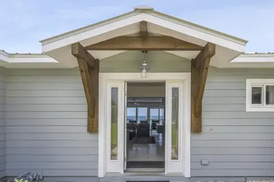 awning over a front door of a house at Ashore Thing in Inlet Beach