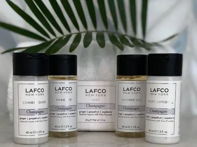a group of four products sitting on a table at Mercado at Rosemary 4A in Rosemary Beach