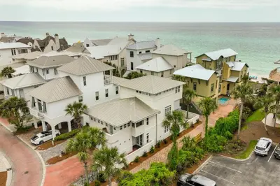 an aerial view of a residential neighborhood with the ocean at Edge of the Sea in Seacrest