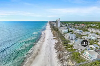 an aerial view of a beach with condos at Sandy Boardwalk in Santa Rosa Beach