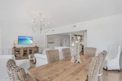 a dining room with a table and chairs at Crossings at WaterSound B105 in Watersound Beach